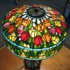 Reproduction Tiffany Tulip Lamp (16"). Sold at school auction. Signatures are those of our daughter's 8 grade class (Class of 2006).